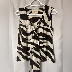 Michael Kors Brown and Cream Print Sleeveless Blouse with front tie. 100%silk